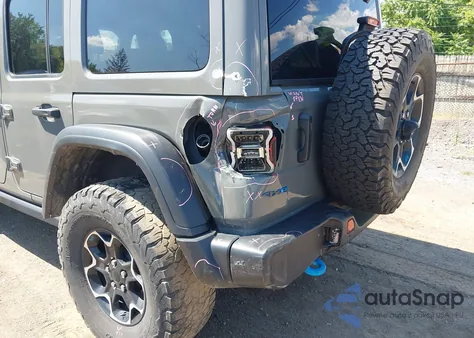 2022 Jeep Wrangler 4Xe Unlimited Rubicon 4X4 из США, поврежденный, VIN 1C4JJXR69NW257809